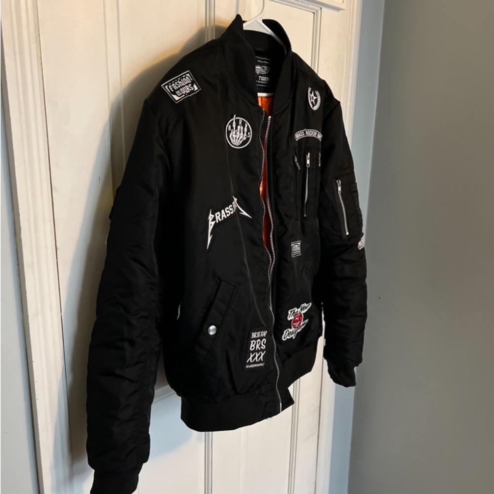 Men’s black jacket with patches